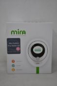 A boxed as new Mira Fertility Plus starter Kit EVA3000 (includes 1 digital analyser and ten test