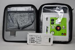 A boxed as new Ami Italia Smarty Saver - Fully Automatic Defibrillator (SM2-B1002).
