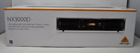 A boxed as new Behringer NX3000D Ultra-Lightweight 3000-Watt Class-D Power Amplifier.