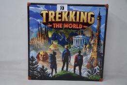 Four boxed as new Trekking The World board games.