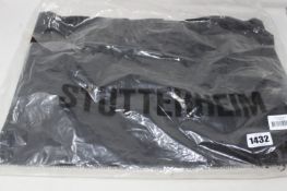 An as new Stutterheim Stockholm coat in black (XS).