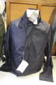 An as new Dunhill London lightweight jacket in navy (M).
