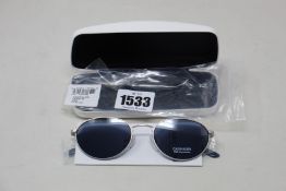 A pair of as new Calvin Klein sunglasses.
