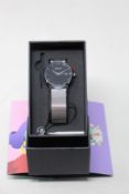 A women's as new Coluri Kahlo watch in black (RRP £139).