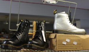 A pair of youths as new Dr Martens 1460 snake effect boots (UK 4 - Unboxed) and a pair of 1460 JR (