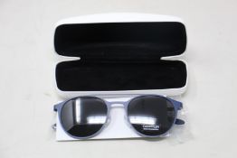 A pair of as new Calvin Klein sunglasses.