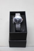 A women's as new Coluri Kahlo watch in black (RRP £139).