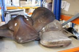 Two pre-owned unbranded horse saddles.