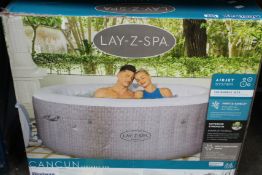 A Lay-Z-Spa Cancum Portable Spa.