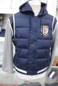 An as new Ralph Lauren down panelled baseball jacket (XS - RRP €185. Please note this item still has