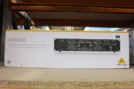 A Behringer NX6000 6000 watt power amplifier.