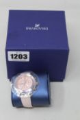 An as new Swarovski Octea Lux watch (RRP £310).