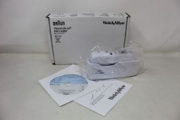 A boxed as new Welch Allyn Braun ThermoScan PRO 6000 ear thermometer with cradle.