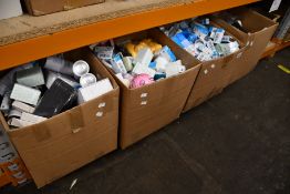 Four boxes of as new toiletries/beauty items/skincare and related items.