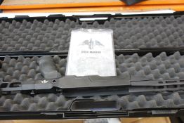 An Akila Chassis System (ACSR8) polymer, folding right with two barrel extensions (One standard