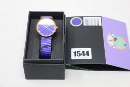 A women's as new Coluri Kahlo watch in violet (RRP £139).
