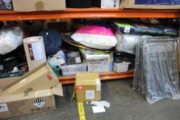 A shelf containing miscellaneous items to include household items, souvenirs and toys.