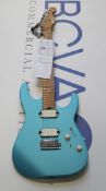 A boxed as new Charvel PRO-MOD DK24 HH 2PT CM Electric Guitar in Matte Blue Frost.