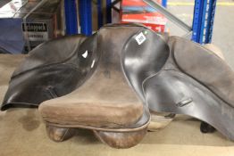 A pre-owned Ideal Wintec horse saddle and a pre-owned MG Saddlery horse saddle.