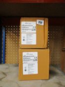 Two Raychem T-100 Splice/Tee Kits.