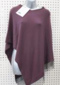 An as new Fabiana Filippi cashmere poncho (RRP £270).