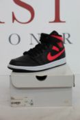 A pair of women's as new Nike Air Jordan 1 mid (UK 6.5).