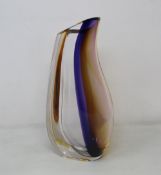 A Kosta Boda Orchid vase in amber.
