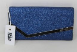 An as new Jimmy Choo Emmie glitter clutch (No tags but item is as new - RRP £520).