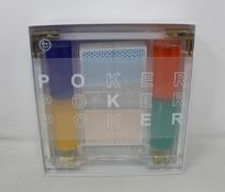 An as new Sunnylife Lucite acrylic poker set.