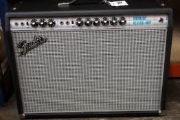 A Fender 68 Custom Vibrolux Reverb Amp.
