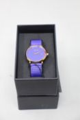 A women's as new Coluri Kahlo watch in violet (RRP £139).