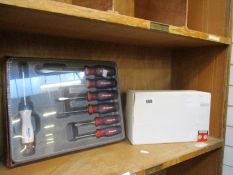 A Snap-On CT9010DD cordless impact wrench (In a plain box, battery not included) and an as new