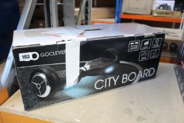 A boxed Go Clever White City Board self balancing, wheels 6.5