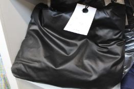 An as new Kassl Editions Pillow Large Oil bag in black (RRP £368).