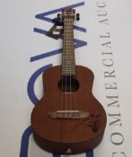 An Ortega Guitars RU5MM-TE Bonfire Series Tenor Ukulele with Tortoise Binding.