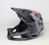A boxed as new Fox Racing Pro Frame helmet in Black Camo (Size: XL).