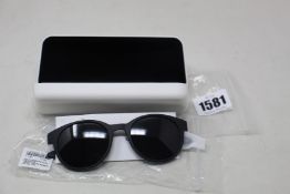 A pair of as new Calvin Klein sunglasses.