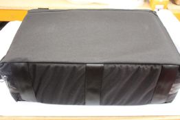An as new Brass Bags Quad musical instrument case.