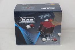 A boxed as new Heritage Audio Baby R.A.M Ultimate Passive-Monitoring System.
