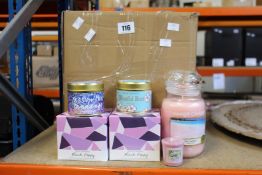 A box of assorted scented candles to include Boom and Yankee.