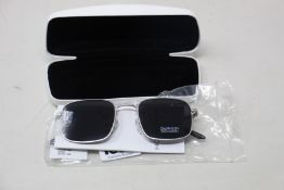 A pair of as new Calvin Klein sunglasses.