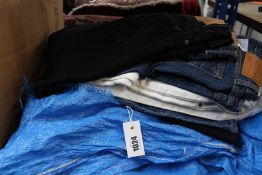 A quantity of pre-owned Levi's jeans (Approximately 40 pairs).