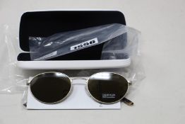 A pair of as new Calvin Klein sunglasses.