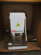 A pre-owned Instron hollow die punch (C-6051-000).