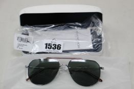 A pair of as new Calvin Klein sunglasses.