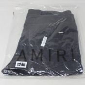 A pair of as new Amiri MX1 leather patch jeans (Size 36).