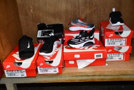 Six pairs of toddlers assorted as new Nike footwear and a pair of Nike Jordan 11 Crib booties.