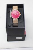A women's as new Coluri Pankhurst watch in scarlet (RRP £139).