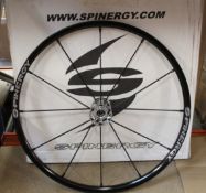 A Spinergy LX.24.12.111 lightweight extreme wheelchair wheel.