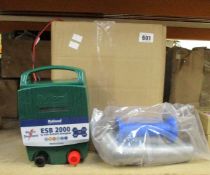 A Rutland ESB2000 Electric Fence Battery Energiser and a quantity of Voss Farming Ringisolator